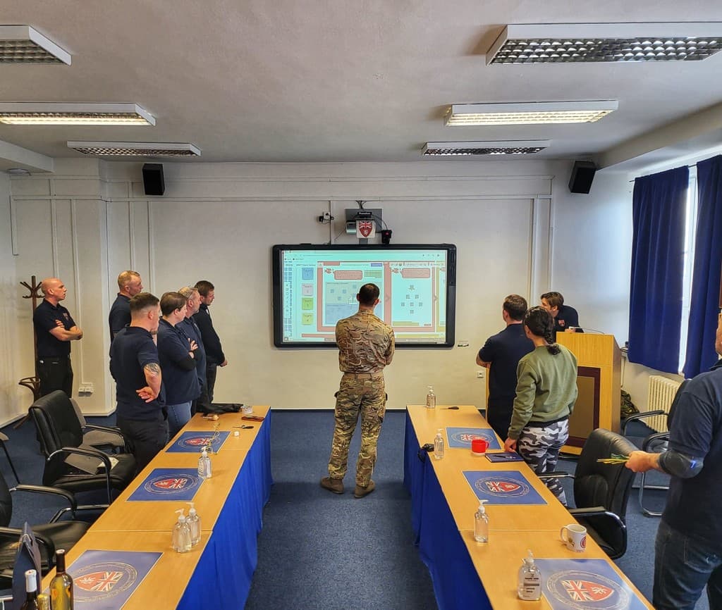 British Army colleagues working together during a facilitated session